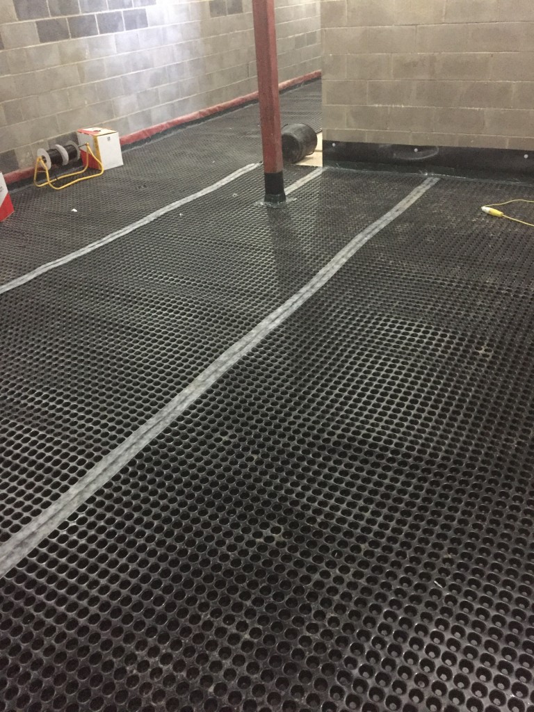 Floor membrane sealed with tape