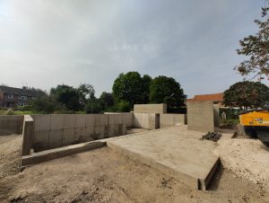 Four separate sections of the basement have facing concrete